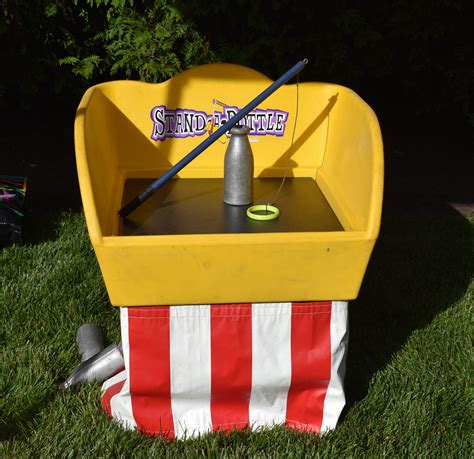 stand a bottle carnival game.